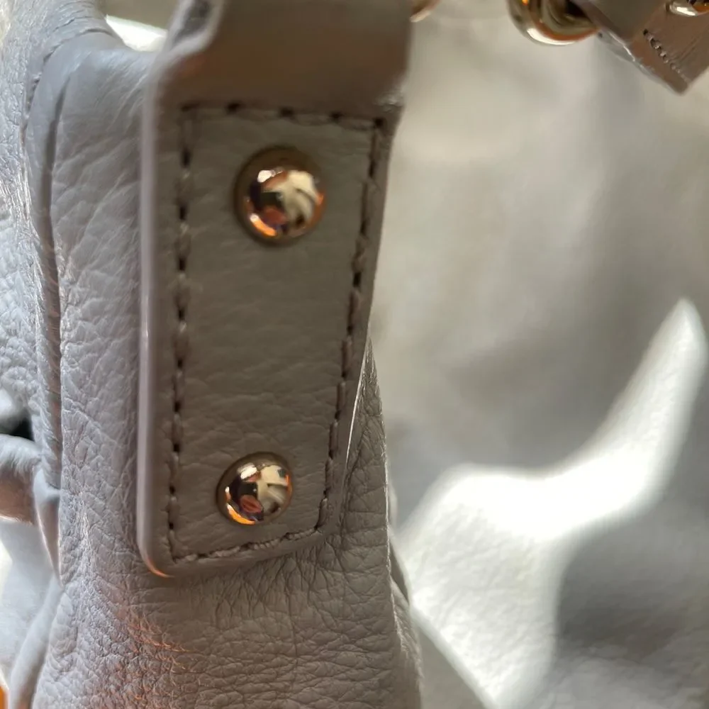 Kate spade/Gray Leather Women's shoulder/crossbody bag lots of pockets!